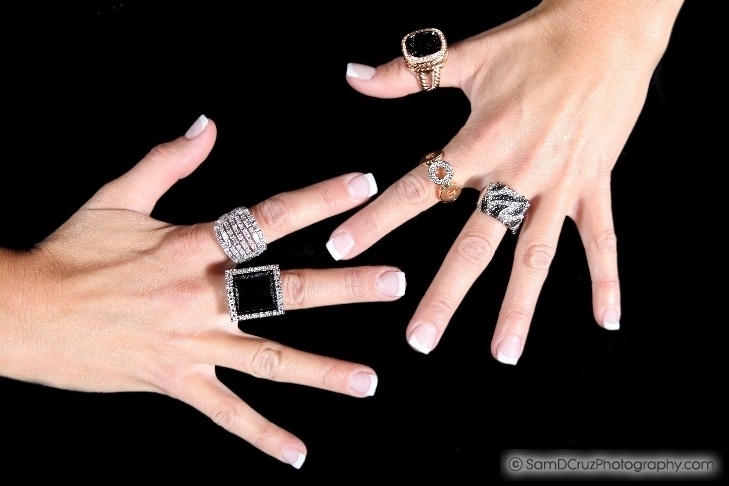 Hands Wearing Luxury Rings