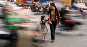 Crossing The Busy Streets of Hanoi, Vietnam