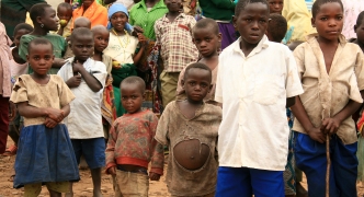 DR CONGO - NOV 2ND : Refugees cross from DR Congo into Uganda at