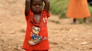 DR CONGO - NOV 2ND : Refugees cross from DR Congo into Uganda at