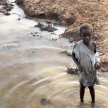 Poor Child - Abuket River, Uganda, Africa
