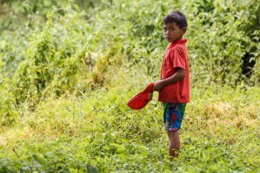 FALAM, MYANMAR - JUNE 17 2015: Local boy in the recently opened to foreigners area of Chin State - western Myanmar (Burma)