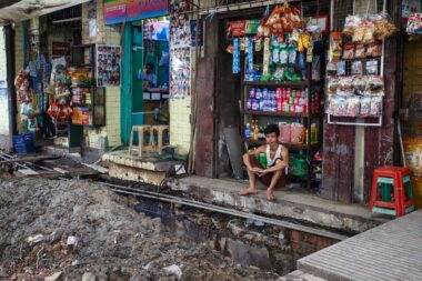 YANGON, MYANMAR - JUNE 12 2015: Local store is open on one of the hottest recorded days before monsoon season in Yangon, Myanmar.