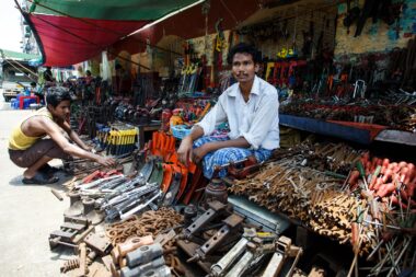 YANGON, MYANMAR - JUNE 12 2015: Metal tool shop on one of the hottest recorded days before monsoon season in Yangon, Myanmar.