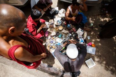 YANGON, MYANMAR - JUNE 12 2015: Secondhand electrical components for sale on one of the hottest recorded days before monsoon season in Yangon, Myanmar.